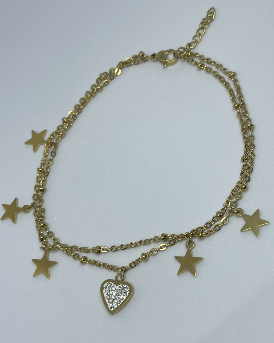 TOBILLERA DOBLE CADENA ESTRELLAS Y CORAZON